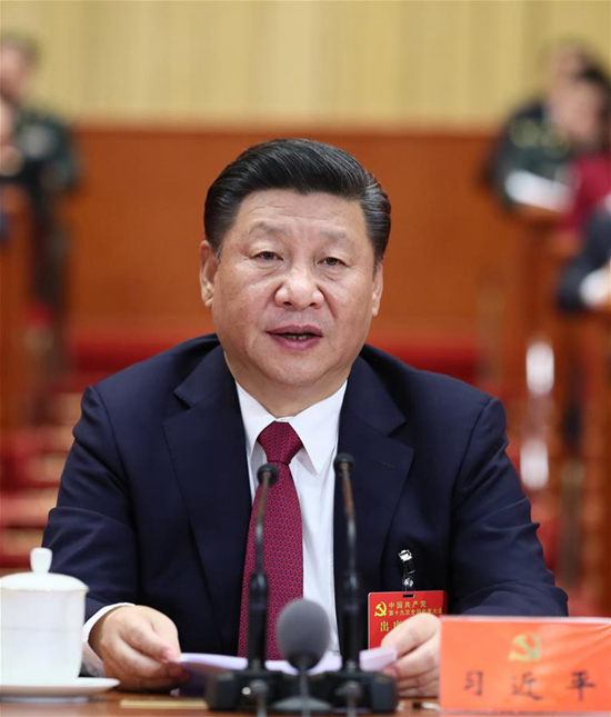 10月24日，中国共产党第十九次全国代表大会在北京人民大会堂胜利闭幕。习近平同志主持大会。 新华社记者 兰红光 摄